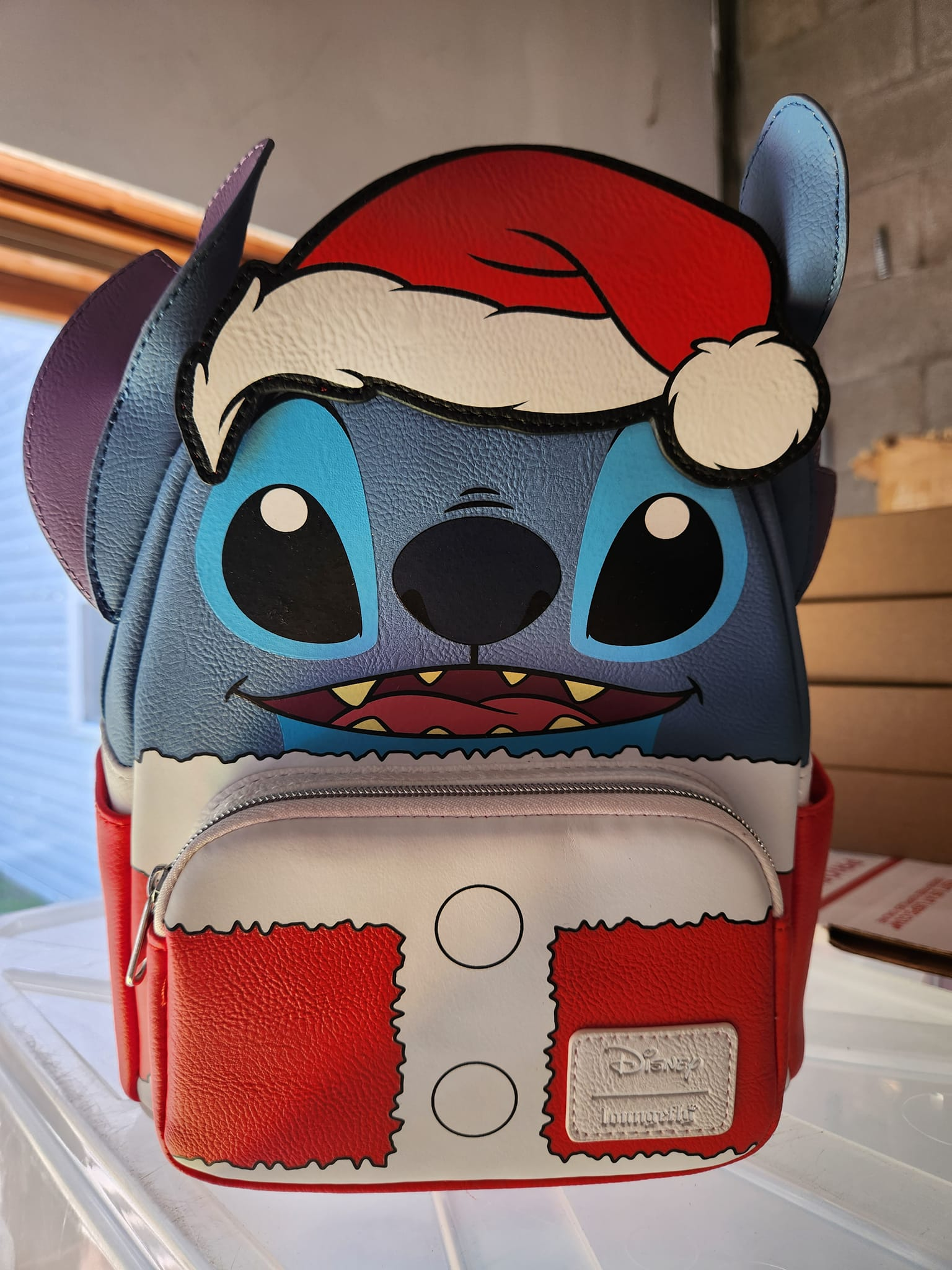 LOUNGEFLY-SANTA STITCH LIMITED EXCLUSIVE